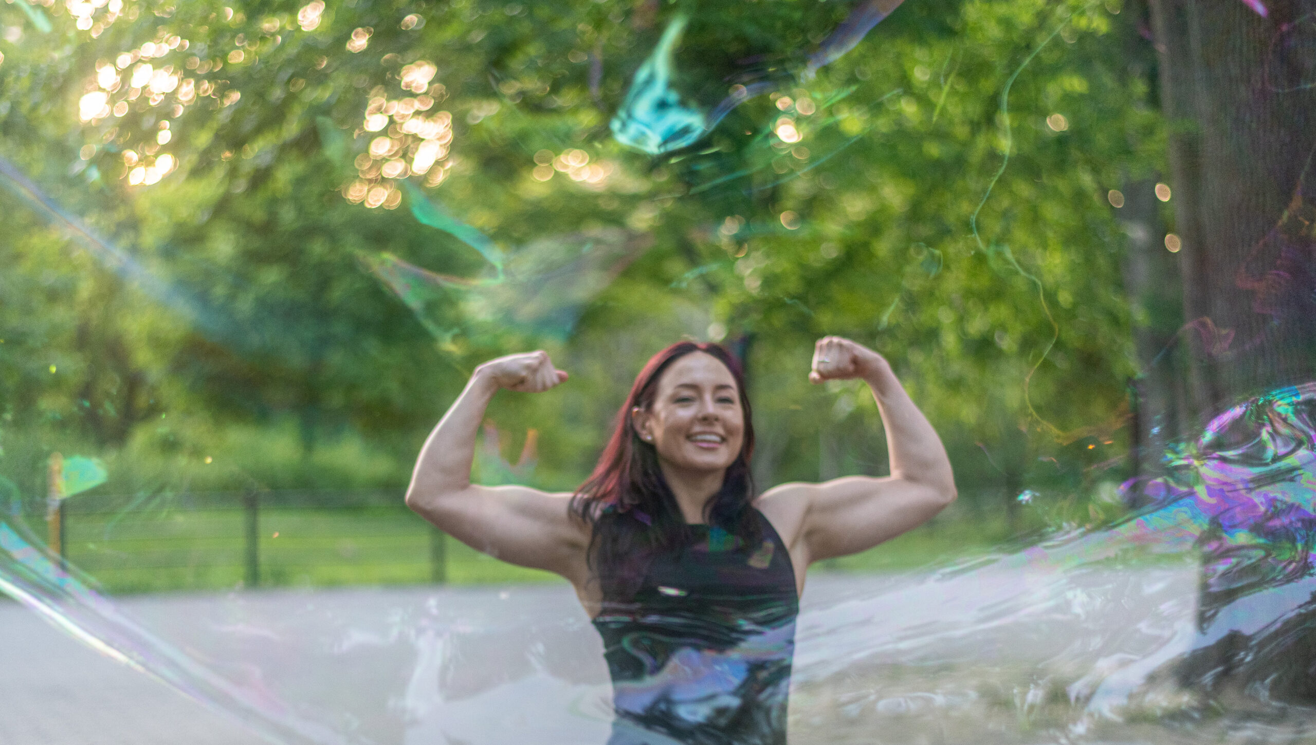 Pic of Lina flexing behind a giant bubble.